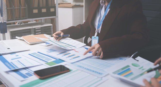 Accounting company provide finance and taxation planning for profitable cash flow, Auditor and accountant team working in office, analyze financial data and accounting record with calculator