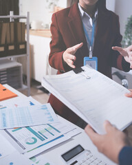 Accounting company provide finance and taxation planning for profitable cash flow, Auditor and accountant team working in office, analyze financial data and accounting record with calculator