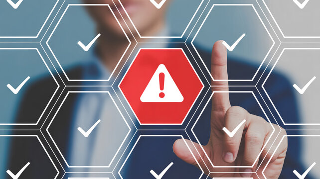Businessman touching warning sign on virtual screen with checkmarks