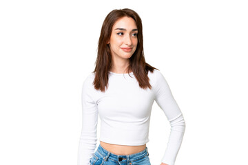 Fototapeta premium Young caucasian woman over isolated chroma key background having doubts while looking side
