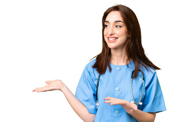 Young nurse woman over isolated chroma key background with surprise facial expression