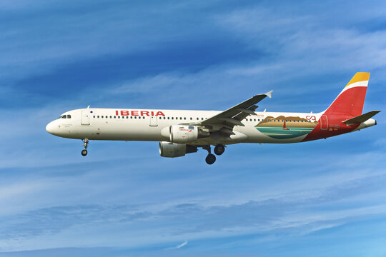 Geneva, Switzerland - february 13, 2026 :  : sign and logo on a Airbus A321-212 of Iberia (Cantabria Infinita Sticker) landing at  Geneva Airport