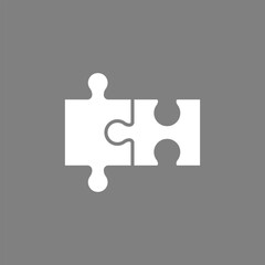 Two white puzzle pieces icon joined together. 2 connecting jigsaw pieces.