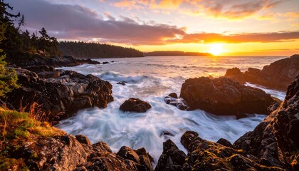 Obraz premium Rocky Coastline with Waves at Sunset.