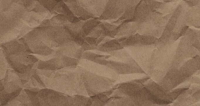 Stop-Motion Crumpled Kraft Paper Texture. Rapid stop-motion animation quick successive changes of wrinkled brown kraft paper osurfaces, creating dynamic textured transitions with visible creases.