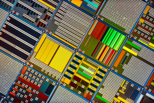 Silicon semiconductor wafer with integrated circuit die mosaic pattern.