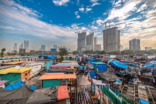 Contrast of Mumbai skyscrapers and Dhobi Ghat laundry.