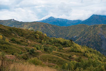 Fototapeta premium Autumn Trekking Path in Svaneti Georgia, Scenic Mountain Landscape from Mestia to Ushguli via Zhabeshi and Adishi, Nature Adventure Concept