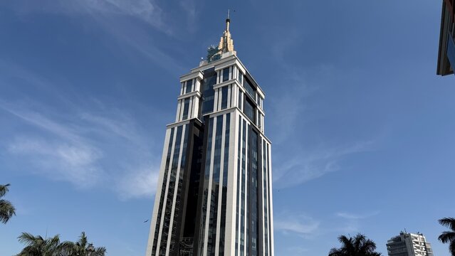 Modern skyscraper at dusk in UB City, Bengaluru. 
