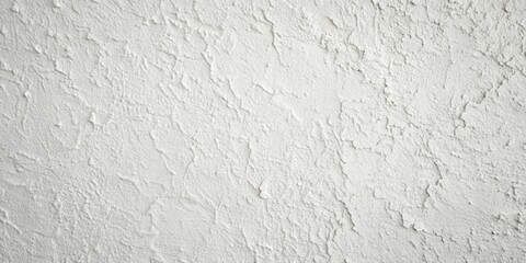 Fototapeta premium Textured white plaster wall with a subtle crack pattern and faint shadows
