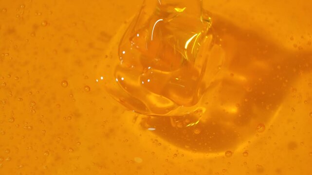 Macro texture of fresh bee honey, honey cooking background
