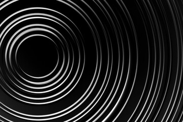 Obraz premium image is white circle on black background. circle is surrounded by series of smaller circles, creating sense of depth and movement