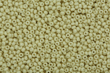 Close up of mustard seeds beads.