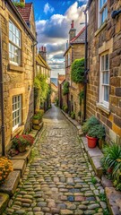 Fototapeta premium Cobblestone path winding through narrow street in old fishing village of Robin Hoods Bay