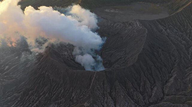 Smoking crater of mount bromo volcano in indonesia