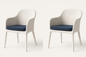 Fototapeta premium Pair of modern white wicker chairs with navy blue cushions, suitable for indoor or outdoor contemporary living spaces.
