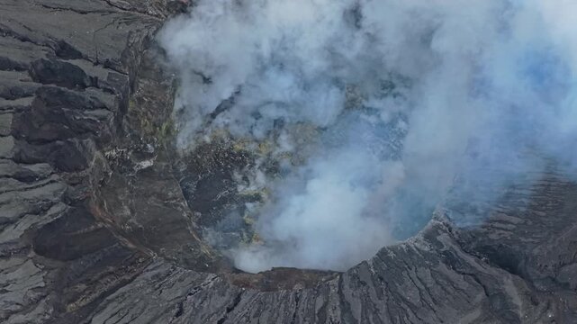Aerial view of mount bromo volcano emitting sulfuric gas