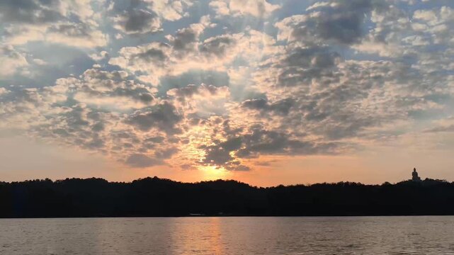 traveling sailing on river lake pond at sunrise sunset