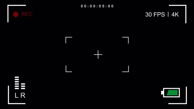 Video capturing a digital camera viewfinder with recording metrics, showcasing a focus area and battery indicator.