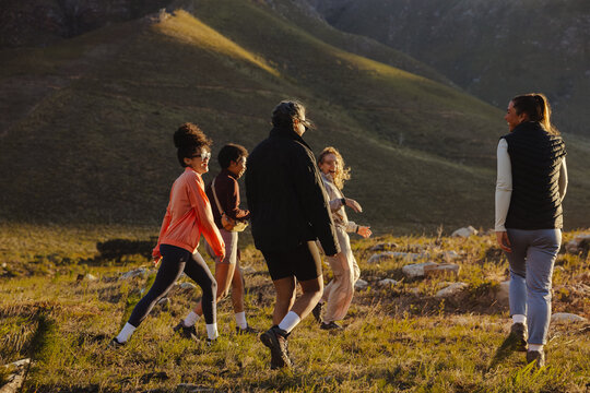 Group hiking in peaceful mountain setting