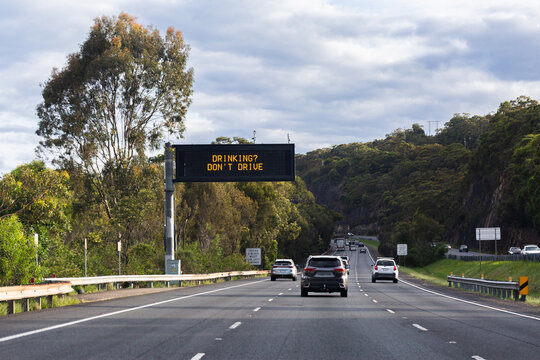 Drinking? Don&rsquo;t drive warning notice text on overhead digital sign above road in NSW Australia 