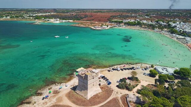 Aerial view of Torre Sant'Isidoro watchtower and beach in Nardo, Puglia, Italy.