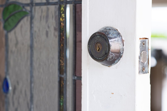 old weathered lock on an older home