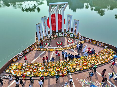 Khulna, Bangladesh - February 21, 2026: People place floral wreaths at the Shaheed Minar, marking International Mother Language Day and Language Martyrs&acirc;&euro;&trade; Day.