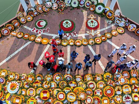 Khulna, Bangladesh - February 21, 2026: People place floral wreaths at the Shaheed Minar, marking International Mother Language Day and Language Martyrs&acirc;&euro;&trade; Day.