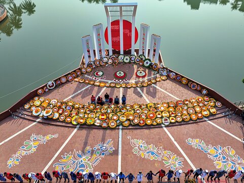 Khulna, Bangladesh - February 21, 2026: People place floral wreaths at the Shaheed Minar, marking International Mother Language Day and Language Martyrs&acirc;&euro;&trade; Day.