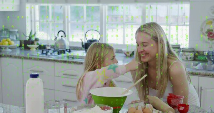 Daughter stirring bowl with spoon and initiating feeding spoonfuls to mother for baking taste test