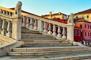 Obraz premium Lion statues on the bridge of Vico, in Chioggia, Italy