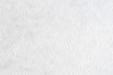Obraz premium White rice paper Xuan or mulberry paper texture background for Chinese arts painting and traditional calligraphy with crumpled, wrinkled pattern