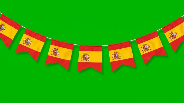A string of Spanish flag pennants against a vibrant green screen background.