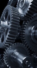 A close-up view of intricately fitted gears in cool shades of gray, symbolizing the inner workings of mechanics, industry, and precision.