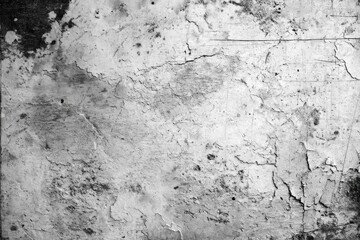 Obraz premium Grunge concrete wall background with cracked texture and peeling paint in black and white for vintage and urban design concept.