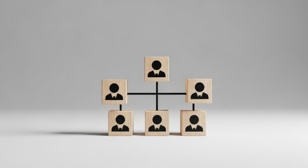 Wooden blocks arranged to depict a hierarchical organizational structure