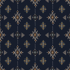 Ethnic seamless pattern. Aztec geometric background. Hand drawn fabric. Modern abstract wallpaper. Vector illustration.