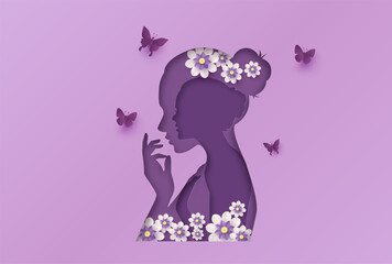 Paper art style vector illustration of a double woman profile silhouette with flowers and butterflies in purple tones, Women's day and inner beauty concept.
