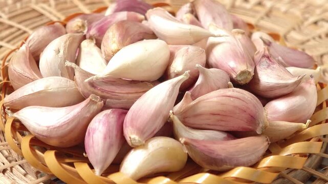A close-up image of garlic cloves.