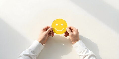 Minimalist Hands Holding Yellow Smile Symbolizing Positive Mental Health Under Sunlight, Creating Inviting Atmosphere in High Resolution