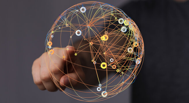 Abstract conceptual image of a hand touching a network globe, representing global connection and technology.