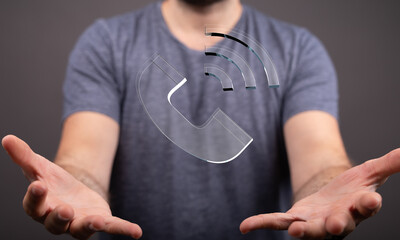 Abstract image of a person holding a phone symbol.  Concept of communication, technology, connection and support.