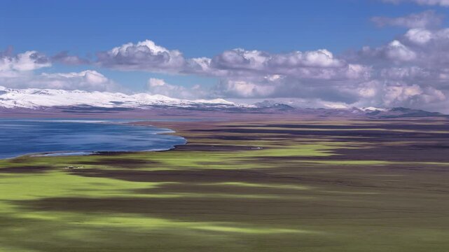 Song Kol Lake And Snowy Mountain Range Kyrgyzstan Aerial View
