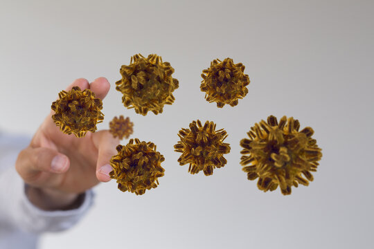 Abstract conceptual image depicting the control of disease, viruses, or microscopic organisms. The hand touche