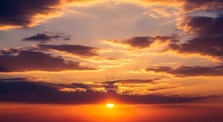Obraz premium Golden sunset sky with distant crescent moon above glowing horizon clouds. Nature concept