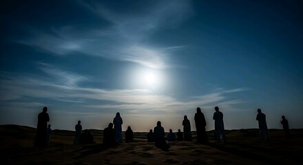 Group of silhouetted worshippers praying beneath bright moon in desert landscape. Religion concept