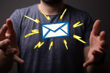 Concept of receiving an email with hands and an illustration of an envelope. Communication, messaging, digital mail, sen © vegefox.com