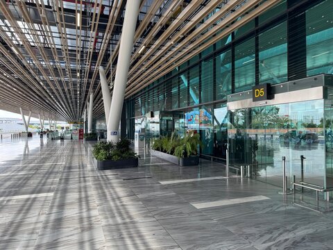 Modern architecture and glass facade of the domestic terminal at Tan Son Nhat airport in Ho Chi Minh City, Vietnam, 2025 