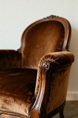 Vintage Upholstered Armchair with Ornate Carvings